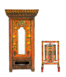 A Tibetan polychrome wood prayer wheel cabinet, 19th century