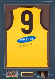 SHANE CRAWFORD (Hawthorn), signature on Hawthorn jumper, window mounted with two action photos & plaque "Hawthorn Football Club, Shane Crawford #9, Testimonial Year 2002", framed & glazed, overall 86x115cm.