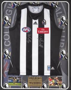 COLLINGWOOD: Collingwood Football jumper signed by Nick Maxwell & Nathan Buckley, window mounted, framed & glazed, overall 60x70cm. With CoA.