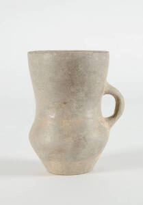 A Persian burnished monochrome grey-ware drinking vessel, Sialk type, 1200-1000 BC with sin