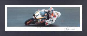 MICK DOOHAN, signed print "Mick Doohan, conqueror", window mounted, framed & glazed, overall 132x66cm. With CoA.