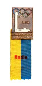 1952 HELSINKI OLYMPICS: Official Badge for Press, rectangular tombac, with yellow & blue ribbon lettered "Radio". Ex Australian broadcaster Norman Banks.