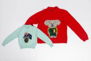 Hand-knitted wool jumpers featuring Willy, the 1984 Australian team mascot, one in red, and a smaller one in pale green.