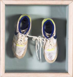 STEVE MONEGHETTI, pair of Nike running shoes, both signed, in display case, overall 41x43x12cm. [Steve Moneghetti competed in the marathon in four Olympic Games - 1988 Seoul, 1992 Barcelona, 1996 Atlanta & 2000 Sydney, his best performance 5th place at Se
