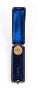 Gilt tie pin 'EXPOSITION UNIVERSELLE DE 1867 A PARIS' surrounding Coat of Arms, 'SAVARD' at base, in original case.