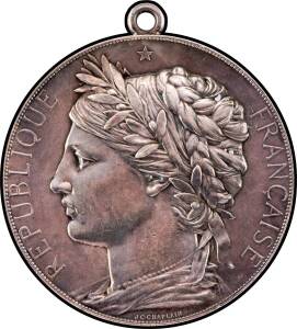 MEDALLIONS: Silver (68mm) with chain loop, bust of France facing left, reverse Victory flying above grounds with trumpet and wreath, awarded to 'HON. P. RUSSELL' &nbsp;carried above winged figure, EF.