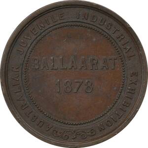 MEDALLIONS: Bronze (47mm) 'AUSTRALIAN JUVENILE INDUSTRIAL EXHIBITION' surrounding 'BALLAARAT / 1878', by E.A Altmann Melbourne, edge (6mm) inscribed 'M.C.SMITH', EF.&nbsp;