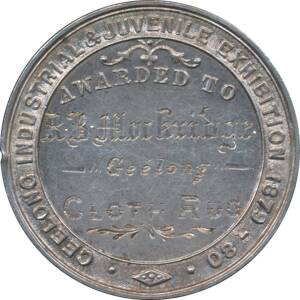 MEDALLIONS: Silver (35mm) 'GEELONG INDUSTRIAL & JUVENILE EXHIBITION 1879-80' awarded to &nbsp;'R.B. MOCKRIDGE / GEELONG' for 'CLOTH RUG', reverse Geelong Coat of Arms above scroll 'BY THE RIGHT USE OF GODS GIFTS', minted by Altmann, EF.