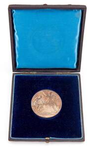 MEDALLIONS: Bronze (63mm) France seated at right crowning a male artisan on anvil by Louis Bottee, reverse Victory seated blowing a trumpet and holding a bust of France above frame inscribed 'D.M. CAMERON' in cased box inscribed&nbsp;'D.M. CAMERON / Secretary 