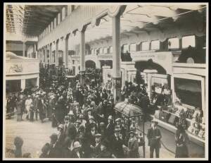 ORIGINAL PHOTOGRAPHS: Group of 4 photographs (21cm. X 16cm.) showing the Visit by King George V and Queen Mary accompanied by the Prince of Wales to the Australian Pavilion on 20 May 1924; similar image from another angle; some of the 70,000 visitors to t