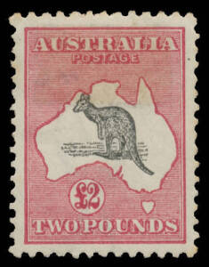 &pound;2 black & crimson SG 56B, unusually well centred, large "hinge" remainder that has slightly stained the face, Cat $6500. [This stamp is an object lesson in why you should never skimp on quality accessories]