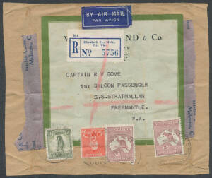 Parcel post group including 1912 piece with Victorian 2/7d franking, 1933 entire parcel wrapping with huge 'PARCEL POST/PRAHRAN' cancel but the stamps sadly removed, 1938 complete packet wrapper registered Melbourne-Perth with 5/2d franking, 1942-48 Food 