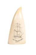 A scrimshaw whale's tooth titled "On The Ground" ♦