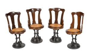 Four ships chairs on cast iron revolving bases, 19th C.