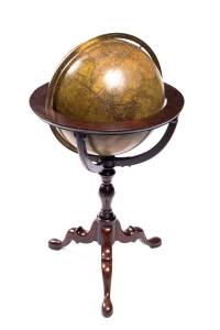 A terrestrial globe of the world on mahogany stand, early 19th century