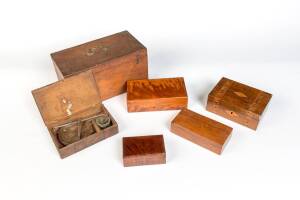 A group of assorted timber boxes and gold scales