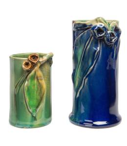 REMUED Two cylindrical pottery vases