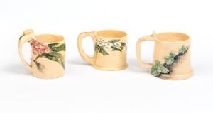 Three hand built pottery mugs