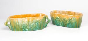 JOHN CAMPBELL Two pottery troughs with embossed floral decorations 