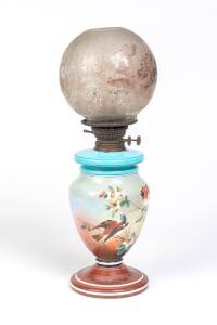 A hand painted glass oil lamp with Duplex double burner and original acid etched shade 