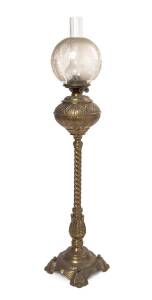 A brass oil lamp with twin burner, shade and chimney 