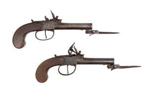 A pair of flintlock pocket pistols by Bradney, circa 1800.