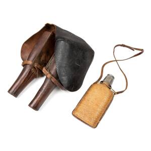 A pair of saddle holsters, and flask, circa 1840