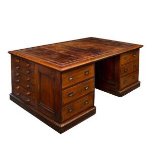 An Australian cedar partners desk by W.H. Rocke & Co.