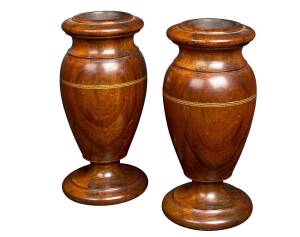 A pair of blackwood urns, circa 1900