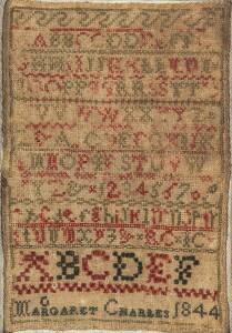 A sampler by Margaret Charles, 1844