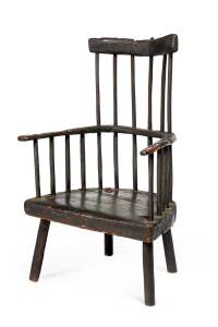 An Australian Jimmy Possum type gum arm chair