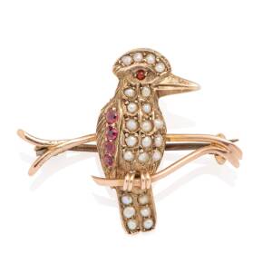 A seed pearl and red stone kookaburra brooch 9ct gold. Weight 3.50 grams. Length 31mm.