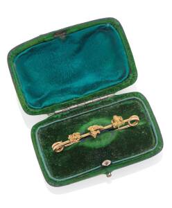 A gold nugget bar brooch. Weight 5.64 grams. Length 58mm. Marked Rhodesia.