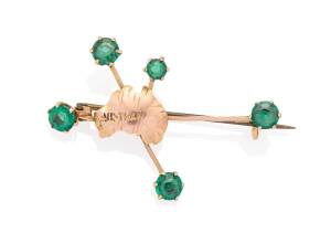 A Southern Cross brooch, H Simonsen, Melbourne, set with green doublets. 9ct yellow gold. Weight 2.97 grams. Length 47mm.