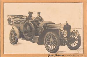 JACK JOHNSON, photograph with title on mount "Jack Johnson driving his Standard Car", framed, overall 67x47cm. Rare advertising photo taken in when he was in Australia for the World Heavyweight title in 1908. 