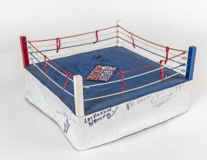 BOXING COLLECTION, noted model of boxing ring with 8 signatures including Lionel Rose; two framed displays of Anthony Mundine; boxing books (7).