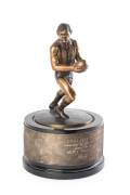 1985 LEIGH MATTHEWS TROPHY, lovely statuette of Leigh Matthews, with plaque engraved "The Leigh Matthews Trophy, Awarded to the player judged by his peers to be the season's Most Valuable Player, Greg Williams, 1985".&nbsp;&nbsp;[It is named in honour of Leigh Matt