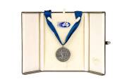1987 MELBOURNE v SYDNEY EXHIBITION MATCH IN CANADA, Player's Medal, with on front "B.C. Place - Vancouver/ Fosters Cup - 1987", and on reverse "International Australian Rules Match/ Runners Up Medallion", in original case.
