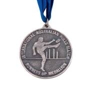 1987 MELBOURNE v SYDNEY EXHIBITION MATCH IN CANADA, Player's Medal, with on front "B.C. Place - Vancouver/ Fosters Cup - 1987", and on reverse "International Australian Rules Match/ Runners Up Medallion", in original case. - 3