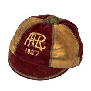 1927 AUCKLAND RUGBY LEAGUE HONOUR CAP, red & yellow velvet, embroidered "ARL 1927", maker's label Cox's Hat Factory, named to "Moana Herewini". Fair/Good condition.