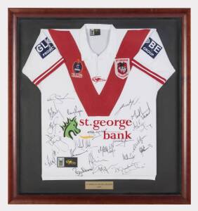 ST.GEORGE ILLAWARRA DRAGONS, signed jumper from 2005 with 21 signatures, framed & glazed, overall 91x96cm.