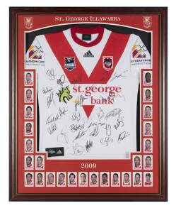 ST.GEORGE ILLAWARRA DRAGONS, signed jumper from 2009 with 23 signatures, window mounted with pictures of players, framed & glazed, overall 89x108cm.