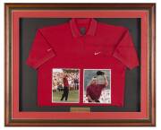 TIGER WOODSsigned Nike shirt, window mounted with two photographs, framed & glazed, overall 113x93cm. Plus signed Ian Thorpe display. - 2