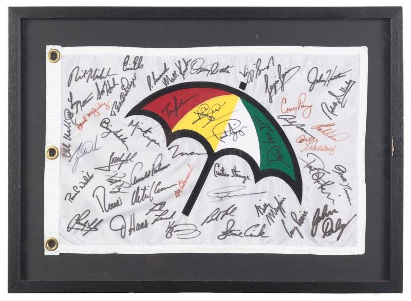 GOLF FLAG (with umbrella logo), with c46 signatures including Tiger Woods, Ernie Els, Vijay Singh, Craig Parry, Curtis Strange & John Daly, framed & glazed, overall 65x47cm.