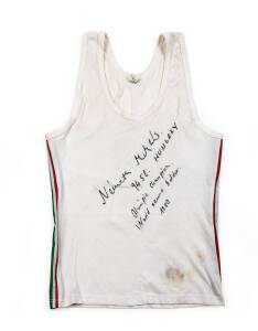 MIKLOS NEMETH'S HUNGARY SINGLET, endorsed "Nemeth Miklos, 94.58 Hungary, Olympic Champion, World record holder, 1980". [Miklos Nemeth won the gold medal in javelin at the 1976 Montreal Olympics with a world record throw of 94.58m].