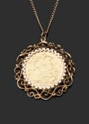 1911 KGV sovereign, as a necklace in an elaborate 9ct mount.. - 2