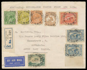 1931 (May 22) Australia - Netherlands East Indies flown registered cover, #204, the colourful frankings all tied by KURRI KURRI cds's and including the scarce 3d Airmail with "Long wing to plane" variety. Most attractive.
