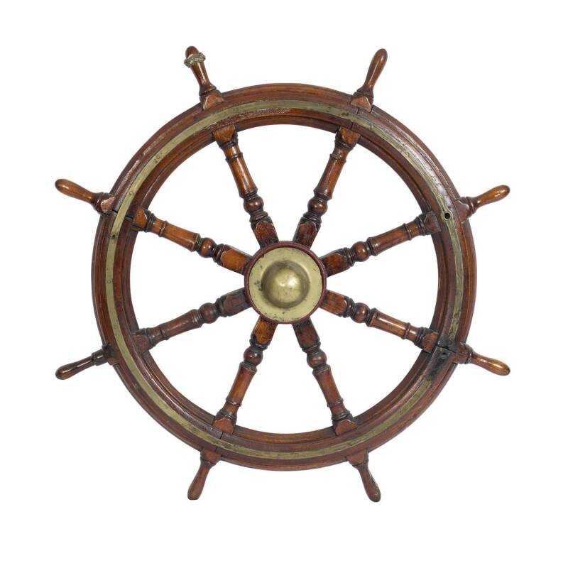 A ship's wheel from the Defender, brass bound oak and rope, 19th century