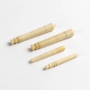 Group of 4 whalebone needle cases, 19th century