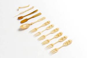 Group of 11 whalebone & mother of pearl spoons & forks